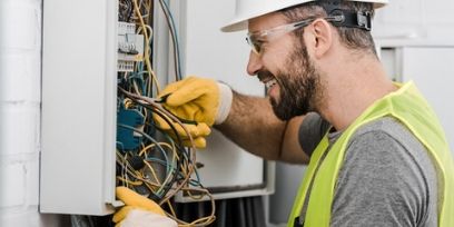 commercial electrical contractor working on Richmond electrical panel
